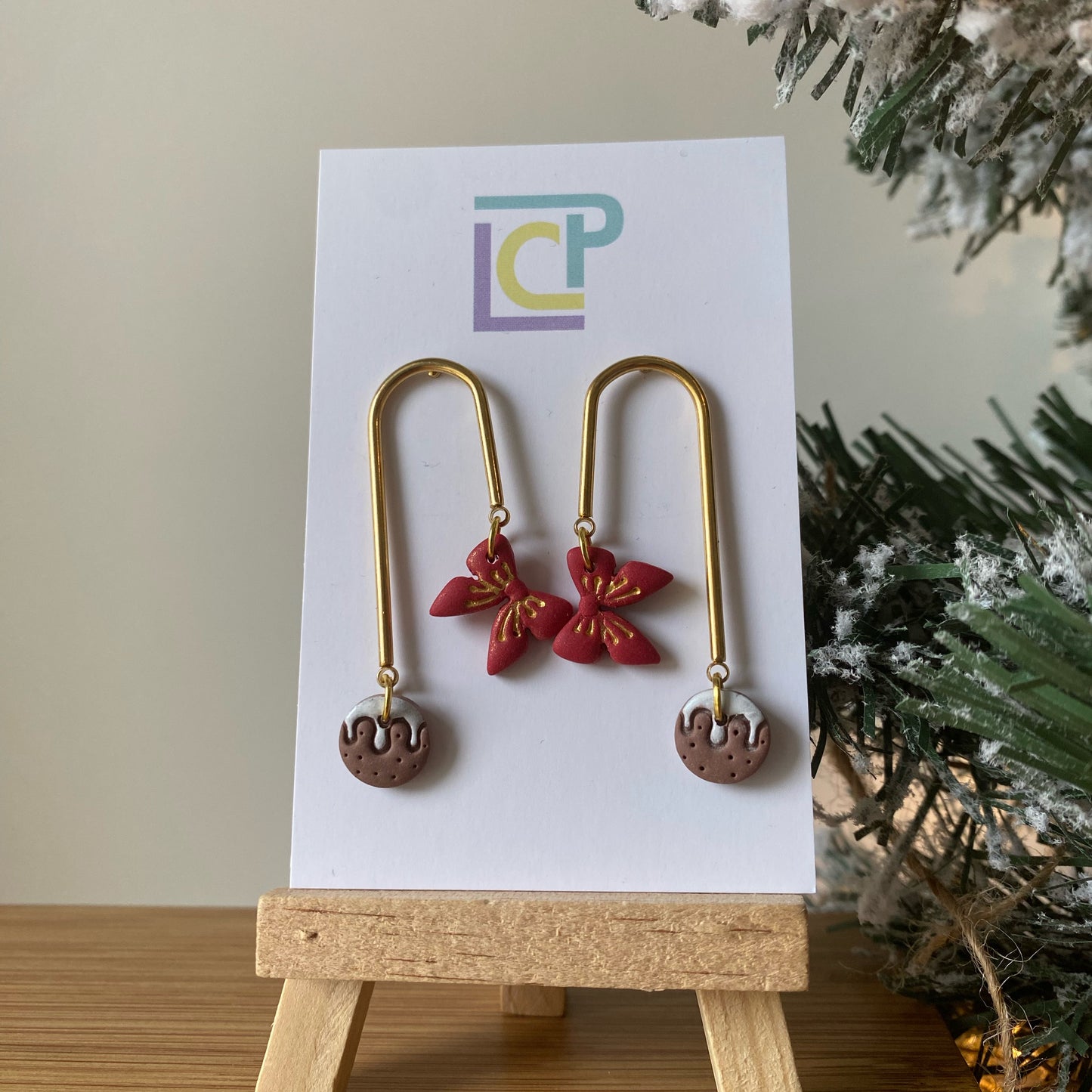 Assymetrical Bow And Pudding Earrings